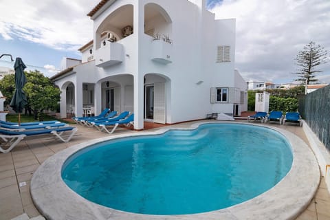 Property building, Living room, Swimming pool