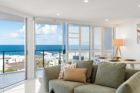 View (from property/room), Living room, Seating area, Dining area, Sea view