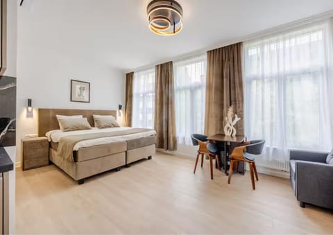Bed, Seating area, Bedroom