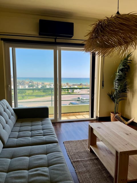 Natural landscape, View (from property/room), Living room, Seating area, air conditioner