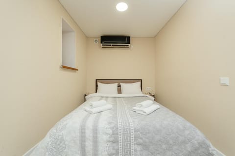Bed, air conditioner