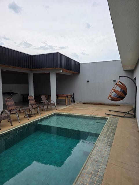 Swimming pool, sunbed