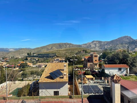 Property building, Day, Natural landscape, Bird's eye view, City view, Mountain view