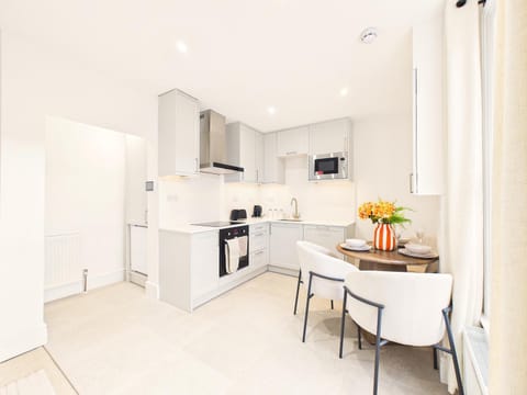 Kitchen or kitchenette, Dining area, dishwasher, oven, stove, toaster