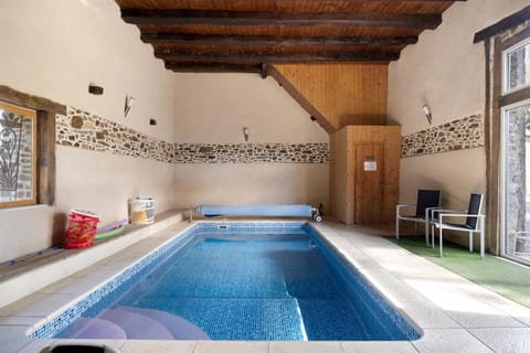 Property building, Living room, Swimming pool