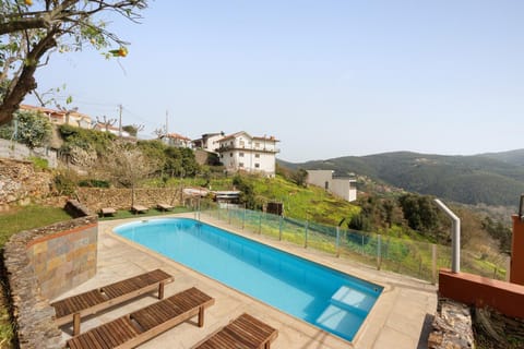 Property building, Living room, Swimming pool