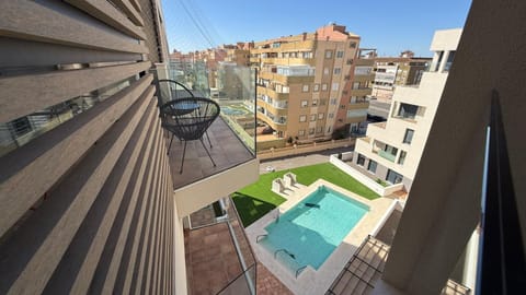 Property building, Patio, Day, Pool view, Swimming pool