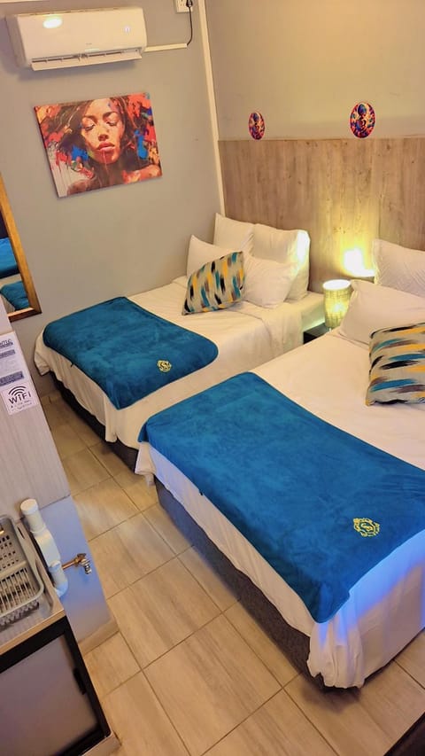 Bed, air conditioner