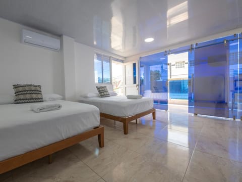 Bed, Photo of the whole room, Bedroom, towels, air conditioner