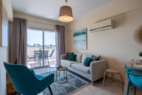 View (from property/room), Balcony/Terrace, Living room, Seating area, air conditioner