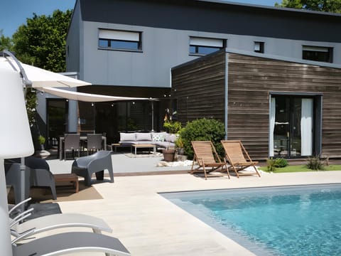 Property building, Living room, Swimming pool