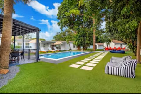 Patio, Day, Garden, Garden, Garden view, Pool view, Swimming pool, sunbed