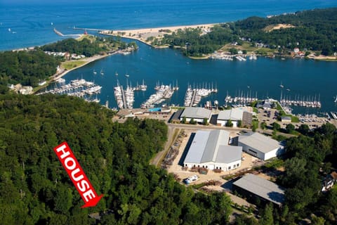 Secluded Woodland Retreat Home with Creekside Deck Near Macatawa Beach in Macatawa, Michigan House in Michigan