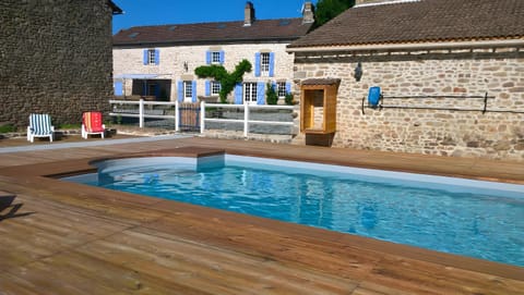Property building, Living room, Swimming pool