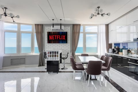 TV and multimedia, Kitchen or kitchenette, Living room, Seating area, Dining area, Sea view