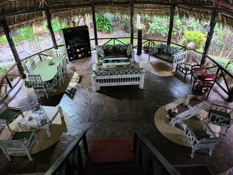 Property building, Patio, Living room, Seating area