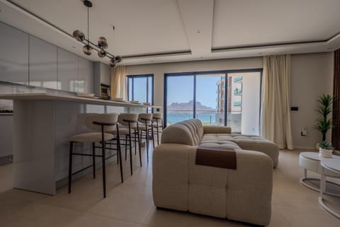 Kitchen or kitchenette, Living room, Dining area, Sea view