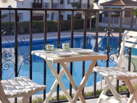Day, View (from property/room), Balcony/Terrace, Dining area, Pool view, Swimming pool