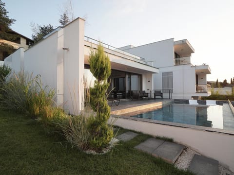 Property building, Patio, Day, Garden, Garden view, Pool view, Swimming pool, sunbed