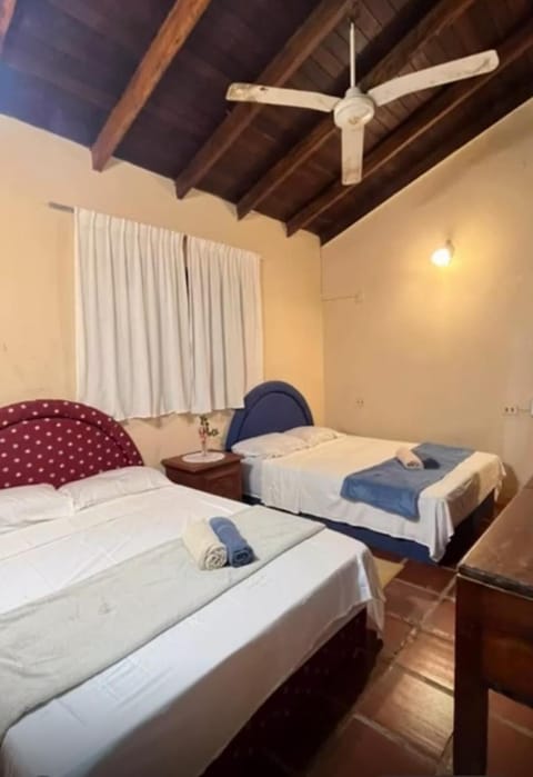 Bed, Photo of the whole room, Bedroom, towels, air conditioner