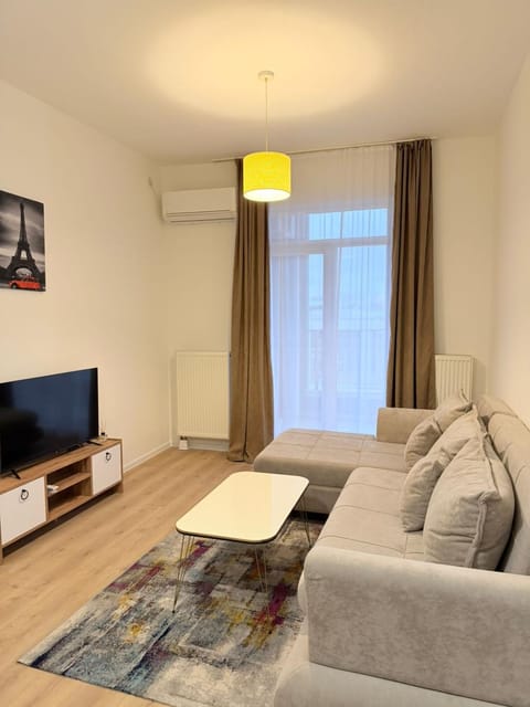 Communal lounge/ TV room, Living room, Seating area, air conditioner