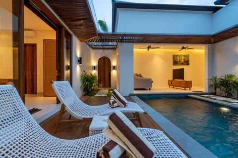 Living room, Seating area, Pool view, Swimming pool, sunbed