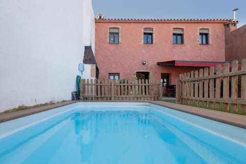 Property building, Living room, Swimming pool