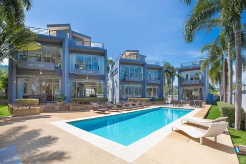 Property building, Day, Pool view, Swimming pool, sunbed