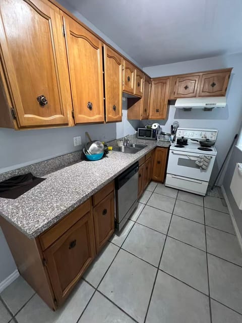 Kitchen or kitchenette, dishwasher, oven, stove, toaster