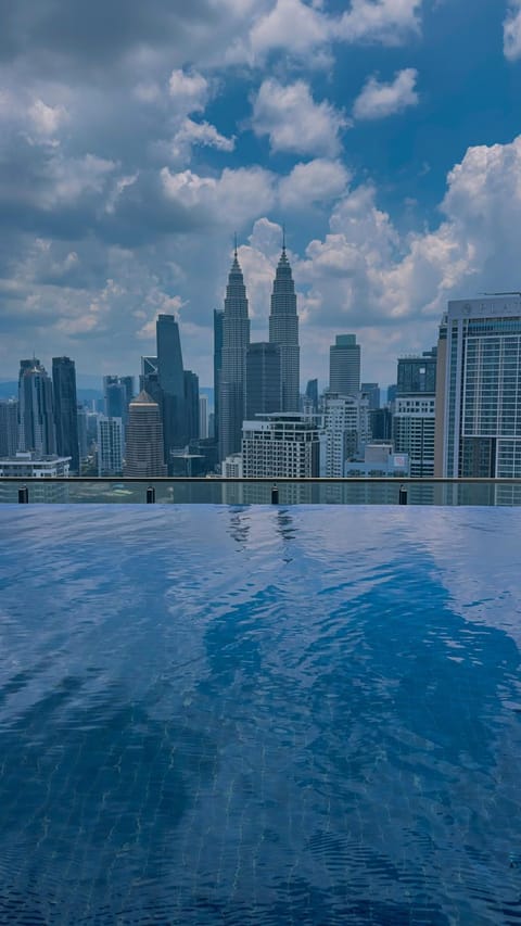 Property building, Day, Natural landscape, City view, Pool view, Swimming pool