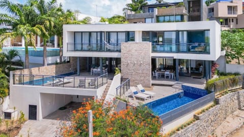 Property building, Patio, Day, View (from property/room), Balcony/Terrace, Pool view, Sea view, Swimming pool, sunbed