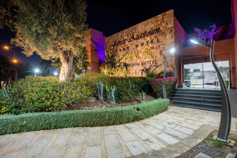 Property building, Facade/entrance, Night, Garden