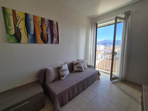 Bed, Living room, Seating area, Mountain view