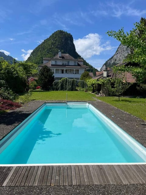 Property building, Spring, Day, Natural landscape, Mountain view, Pool view, Swimming pool