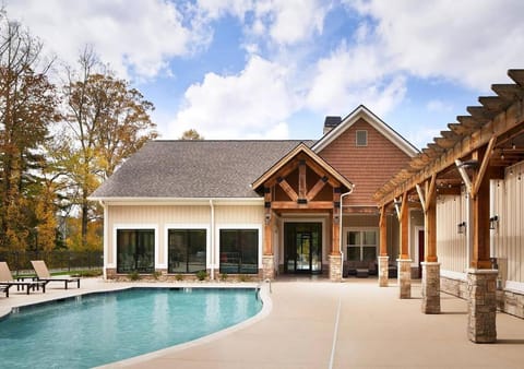 Property building, Pool view, Swimming pool, sunbed