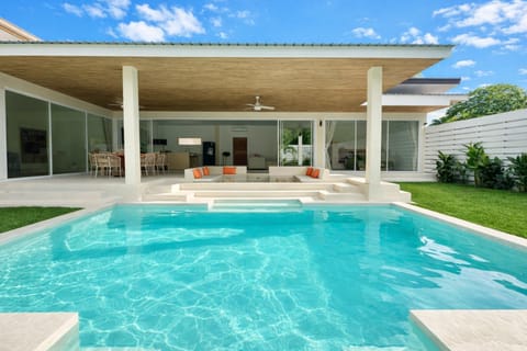 Property building, Patio, Day, Garden, Pool view, Swimming pool, Swimming pool
