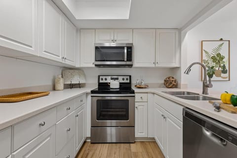 Kitchen or kitchenette, dishwasher, oven, stove, toaster