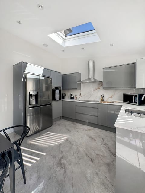 Kitchen or kitchenette, dishwasher, oven, stove, toaster