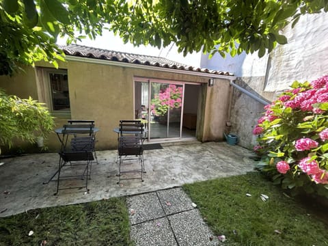 Property building, Patio, Dining area, Garden view
