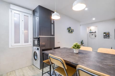 Dining area, microwave, washing machine, kitchen
