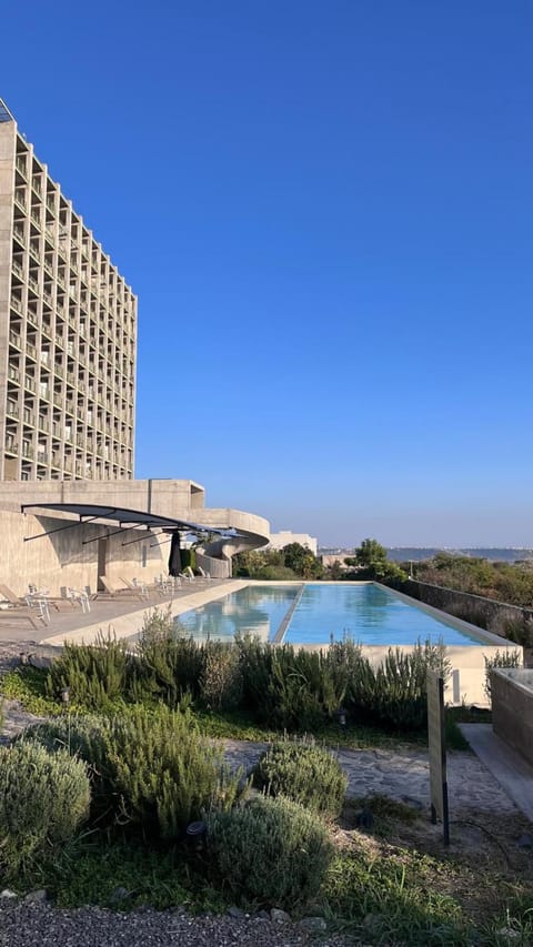 Property building, Day, Natural landscape, Pool view, Swimming pool