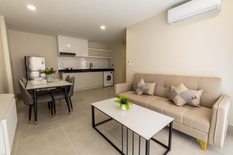Property building, Kitchen or kitchenette, Seating area, air conditioner