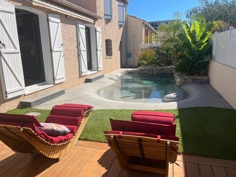 Property building, Living room, Swimming pool