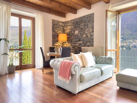 Natural landscape, View (from property/room), Living room, Seating area, Lake view, Mountain view