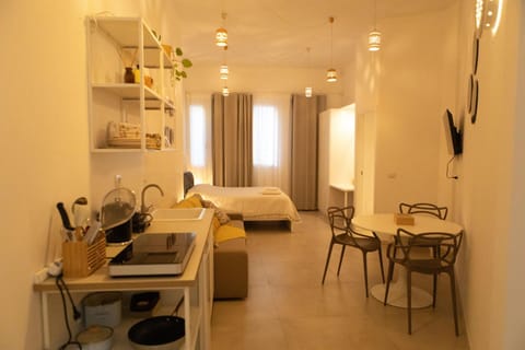 Kitchen or kitchenette, Living room, Photo of the whole room, Seating area, stove