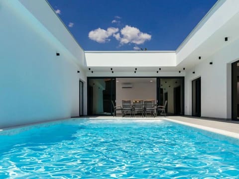 Facade/entrance, Swimming pool