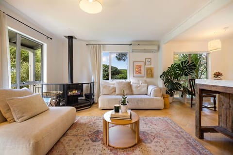 Living room, Seating area, fireplace, air conditioner