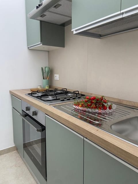Kitchen or kitchenette, stove