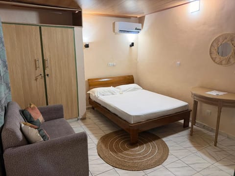 Bed, Seating area, Bedroom, air conditioner