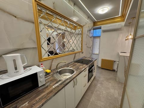 Kitchen or kitchenette, stove